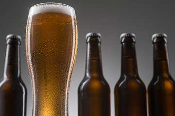 Bottles and glass of beer