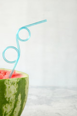 Watermelon with straw, water, beverage