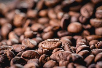 Close up of coffee beans are the background.