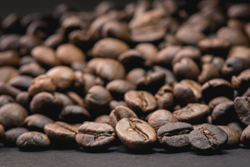 Close up of coffee beans are the background.