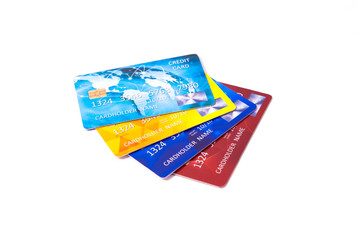 Closeup of a set of colourful credit cards isolated on white background