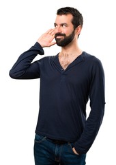 Fototapeta premium Handsome man with beard listening something