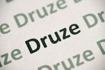 word Druze printed on paper macro