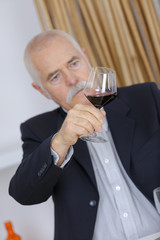 man with a glass of wine