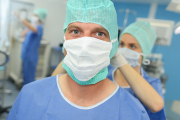 Fototapeta na wymiar portrait of a surgeon in front of the operation room