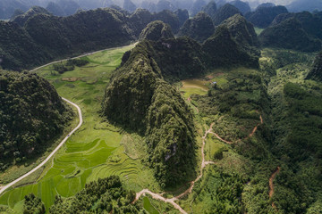 Aerial view of Karst mountains and rice fields