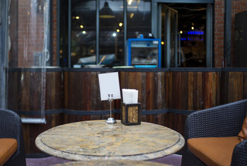 Chairs and tables of a restaurant outdoor photo