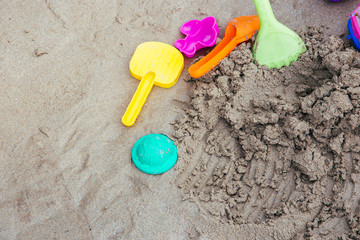 Fototapeta na wymiar toys on tropical sand beach