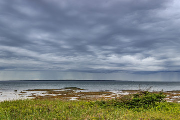 Rain coming over the river