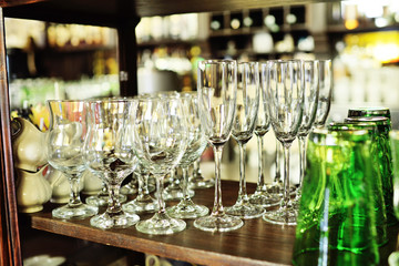 glasses for wine and champagne on the background of a close-up bar