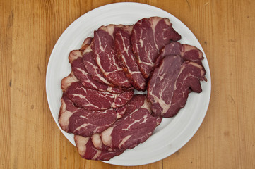 Smoked dried meat as appetizer