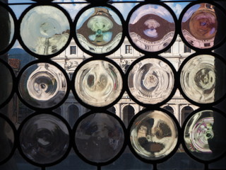 Bergamo, the old town . One of the beautiful city in Italy. Landscape at the public library Angelo Mai through the Venetian windows of the ancient administration building