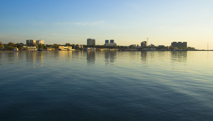 Fototapeta na wymiar City on the horizon and sky reflection