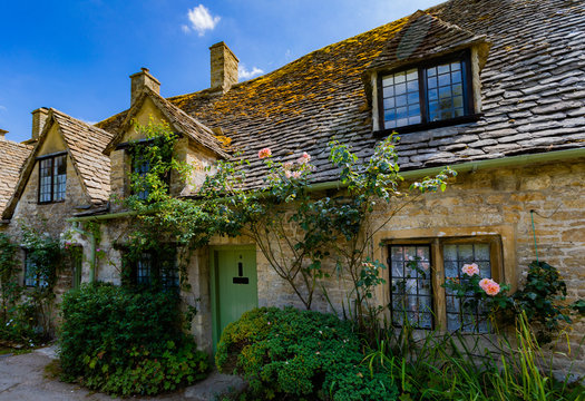 Medieval Cotswold stone cottages of Arlington Row in the village of Bibury, England