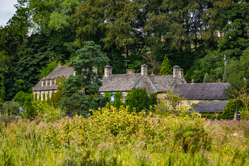 Fototapeta na wymiar Medieval Cotswold stone cottages in the village of Bibury, England