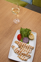 Mackerel Fish and wine for dinner in Turkish Restaurant
