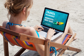 travel insurance online concept, tourist looking at the screen of computer