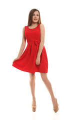 beautiful blonde in a red dress on a white background