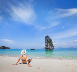 beach holidays, travel to Thailand, woman tourist  relaxing near turquoise sea, tourism destination abroad