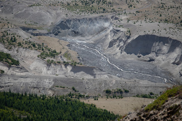 water flowing through the ash at the base of mount saint helens in the pacific northwest