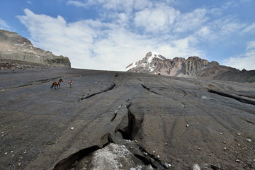  CauTreking in the mountains of the Large Caucasus. Road for the Kazbek peak. Stepantsminda, Georgiacasus mountains, peak Kazbeg, Georgia