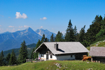 Fototapeta na wymiar Kohler Alm mountain hut near Inzell, with Sonntagshorn at Chiemgau alps