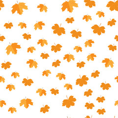 Seamless pattern of autumn yellow leaves randomly