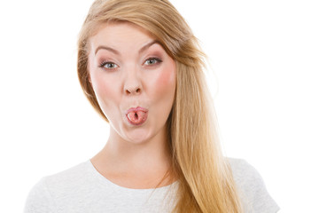 Naklejka premium Funny blonde woman sitcking tongue out