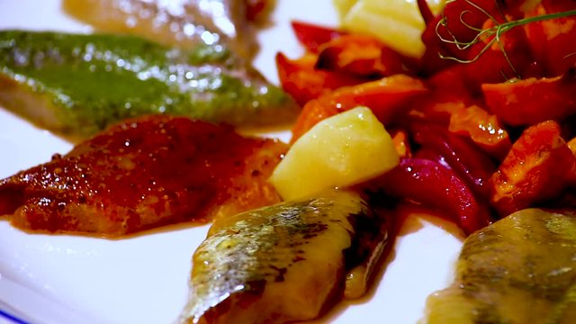 Dish with pickled herring Mathias and vegetables