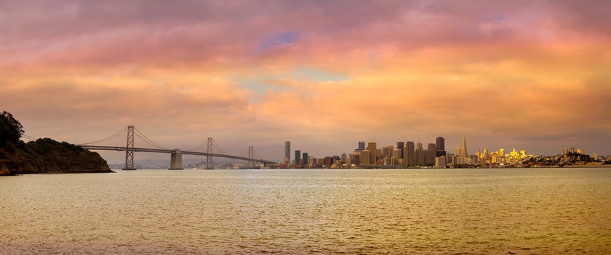 San Francisco CA City Skyline By Bay Bridge During Beautiful Sunset