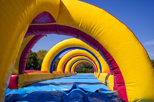 Inflatable colorful attraction playground for children and families in a city park