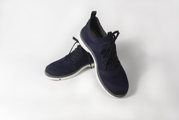 Footwear modern running sport shoes pair on isolated white background.