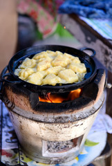 Kanom Luk Don,  local Songkhla Province, Thailand has a sweet made from flour and sugar and eggs eat with the shredded coconut