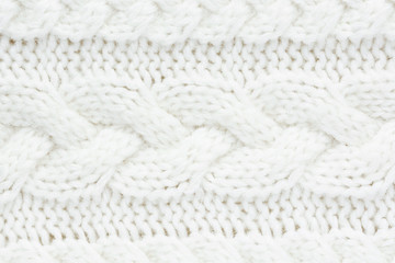 Knitted warm white winter sweater. Huggy style