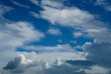 Fototapeta premium Beautiful dark blue sky and white clouds go with each other after heavy rain purifying fine dusts in the air.