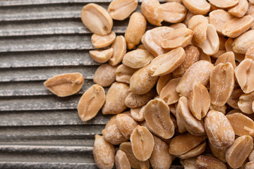 fresh peanuts on a wooden rustic background