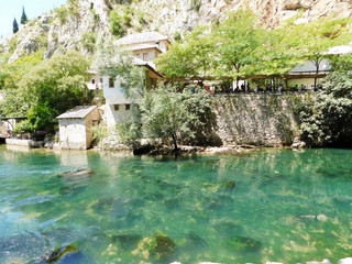 Dervish monastery in Blagaj, during sunny day, river Buna