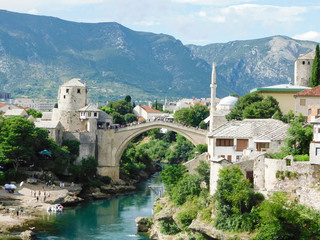 Fototapeta na wymiar Panorama of Mostar Old Town on holiday day, Bosnia and Herzegovina