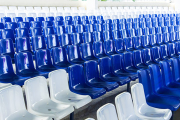 Fototapeta premium Row of chairs in blue and white