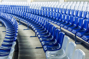 Fototapeta premium Row of chairs in blue and white