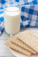 Milk with crunchy oatmeal breads in morning