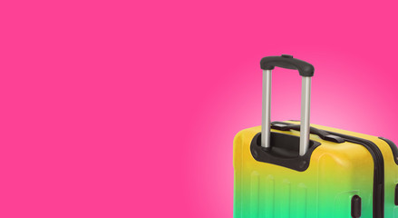 Colorful horizontal banner with suitcase and copyspace. Travelling concept.