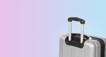 Colorful horizontal banner with suitcase and copyspace. Travelling concept.