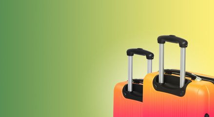 Colorful horizontal banner with two suitcases and copyspace. Travelling concept.