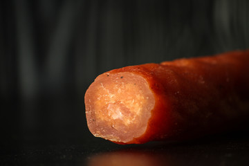 salami cheese-dried smoked sliced ​​slices (sausages) . food background.  Top view with copy space