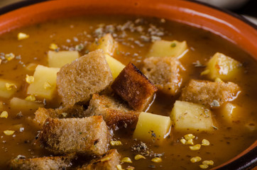 Goulash soup with croutons and potatoes