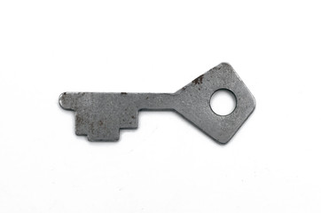 Old key isolated on white background.