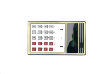 Vintage calculator of the 70s isolated on white background.