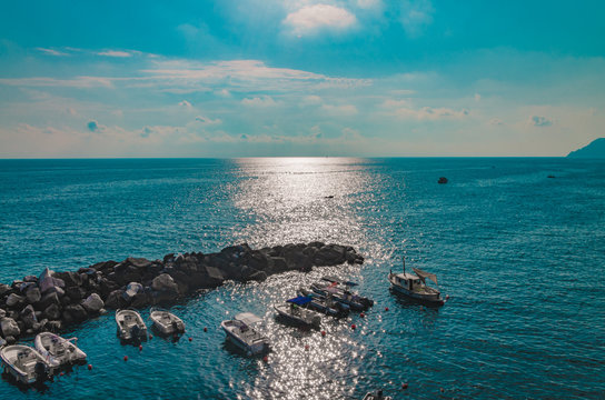 rosse sul mare con riflesso