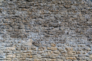 Detail of a medieval stone wall, Cotswolds, England
